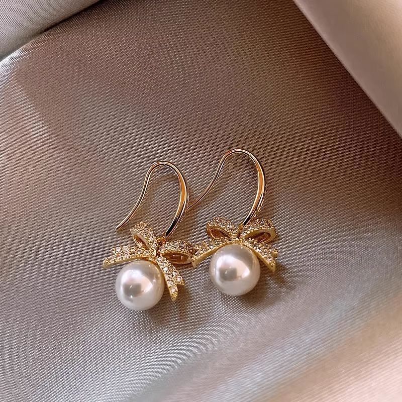 Pearl Bow Luxe Earrings